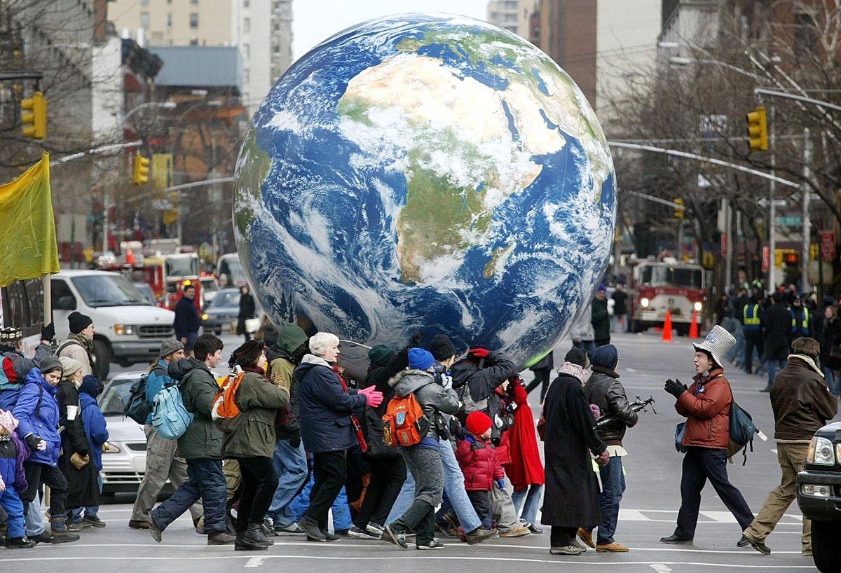 Antiwar protestors carry an inflatable globe through New York City as part of the massive, worldwide protests of February 15, 2003 opposing the Bush administration’s drive towards war in Iraq